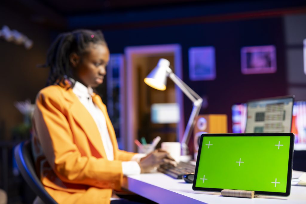 close up of isolated screen tablet used by broker investor watching videos